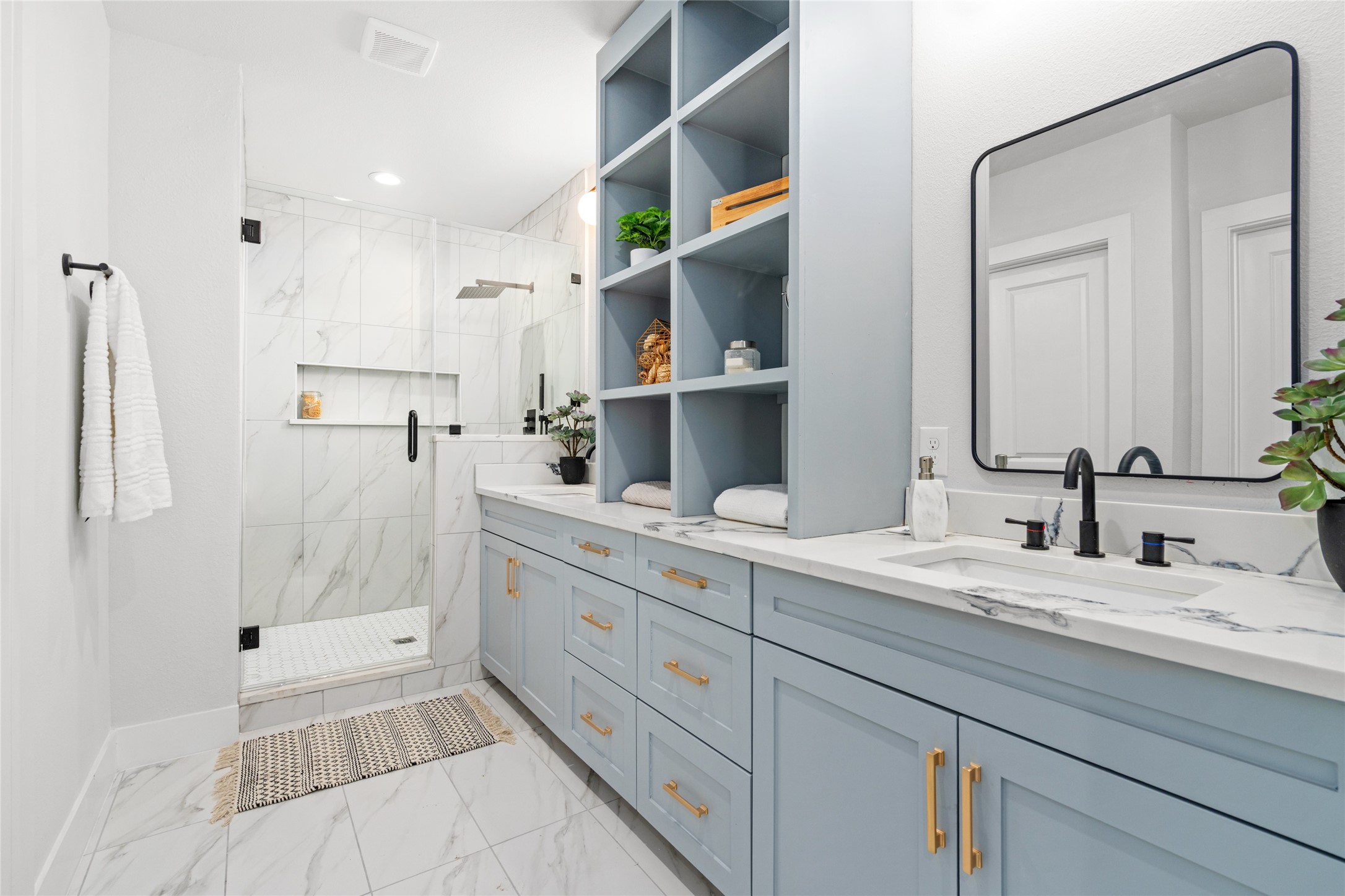5420 Pease Street Houston, TX 77023 - Photo 32 of 43 a bathroom with a double vanity sink mirror and shower