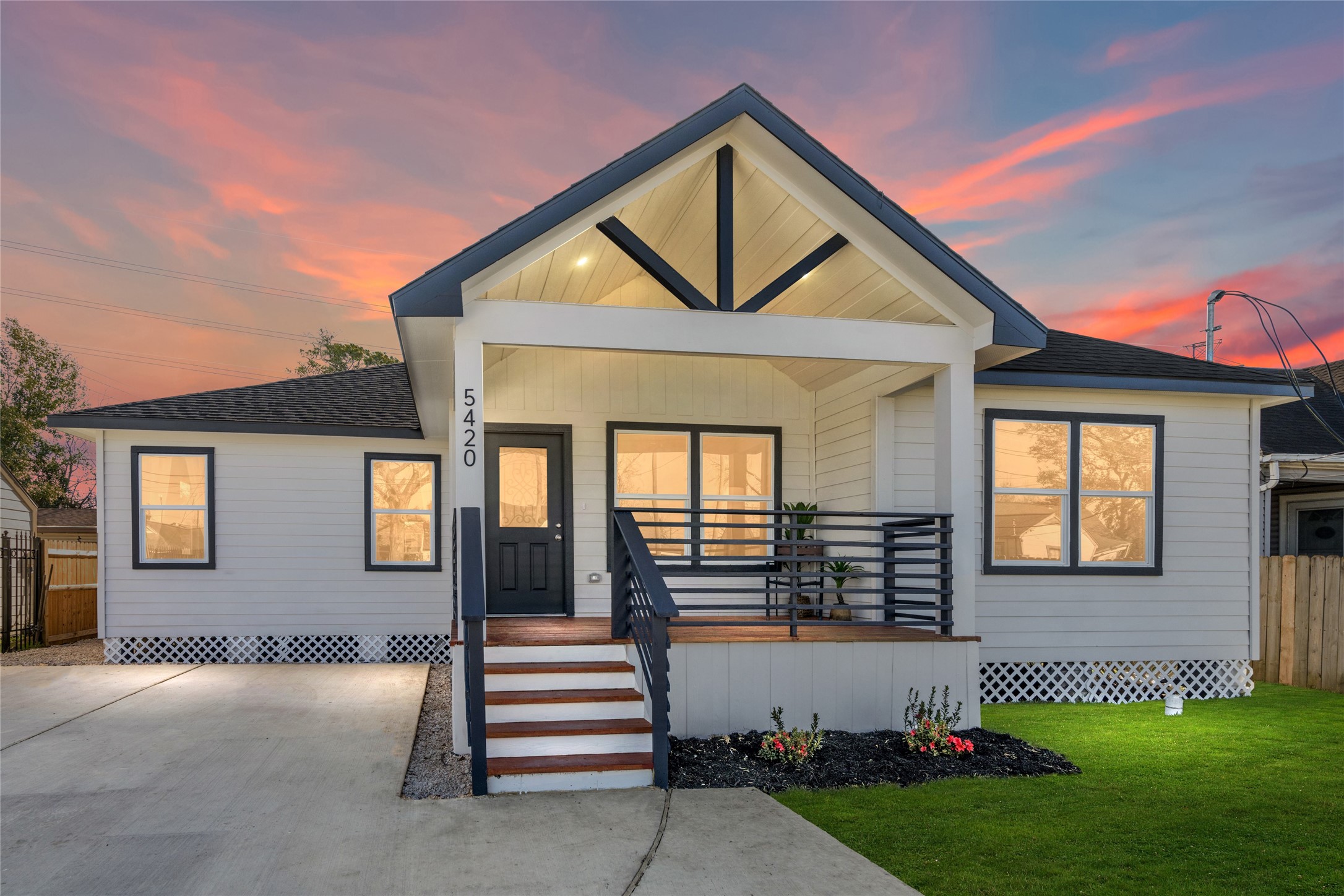 5420 Pease Street Houston, TX 77023 - Photo 4 of 43 a front view of a house with garden