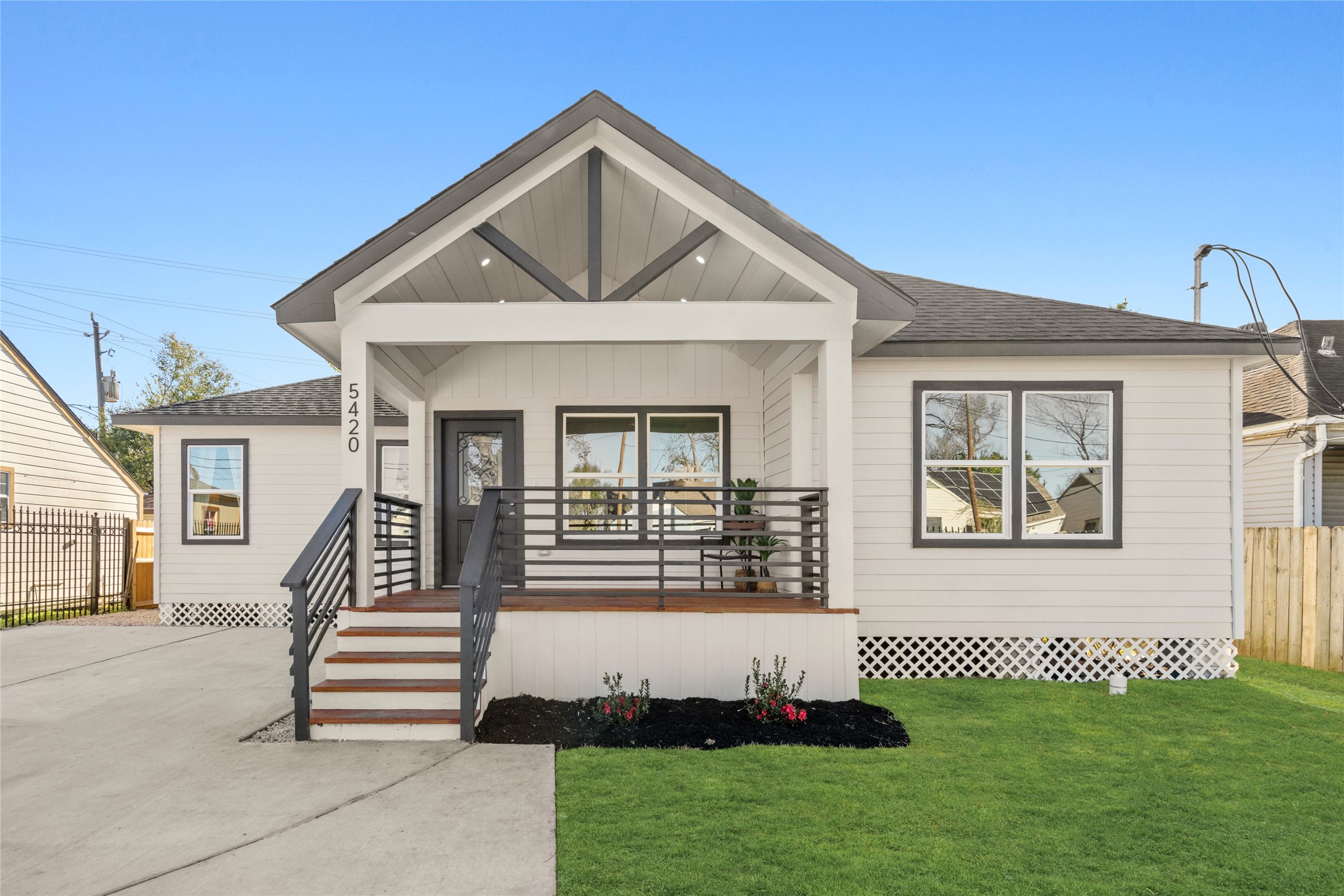 5420 Pease Street Houston, TX 77023 - Photo 41 of 43 a front view of a house with a yard