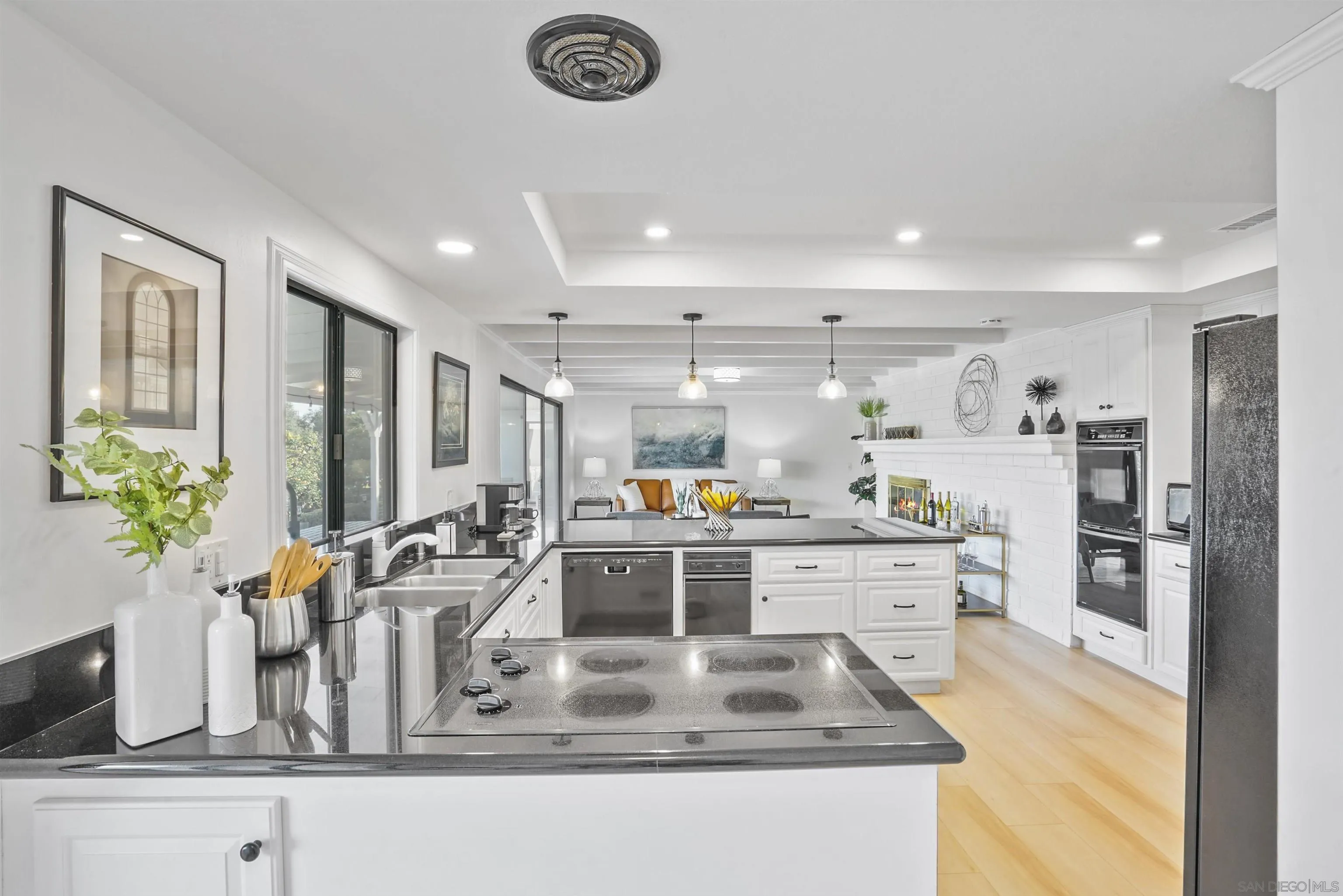 174 Vía De Casa Fallbrook, CA 92028 - Photo 11 of 47 a kitchen with kitchen island granite countertop lots of counter top space
