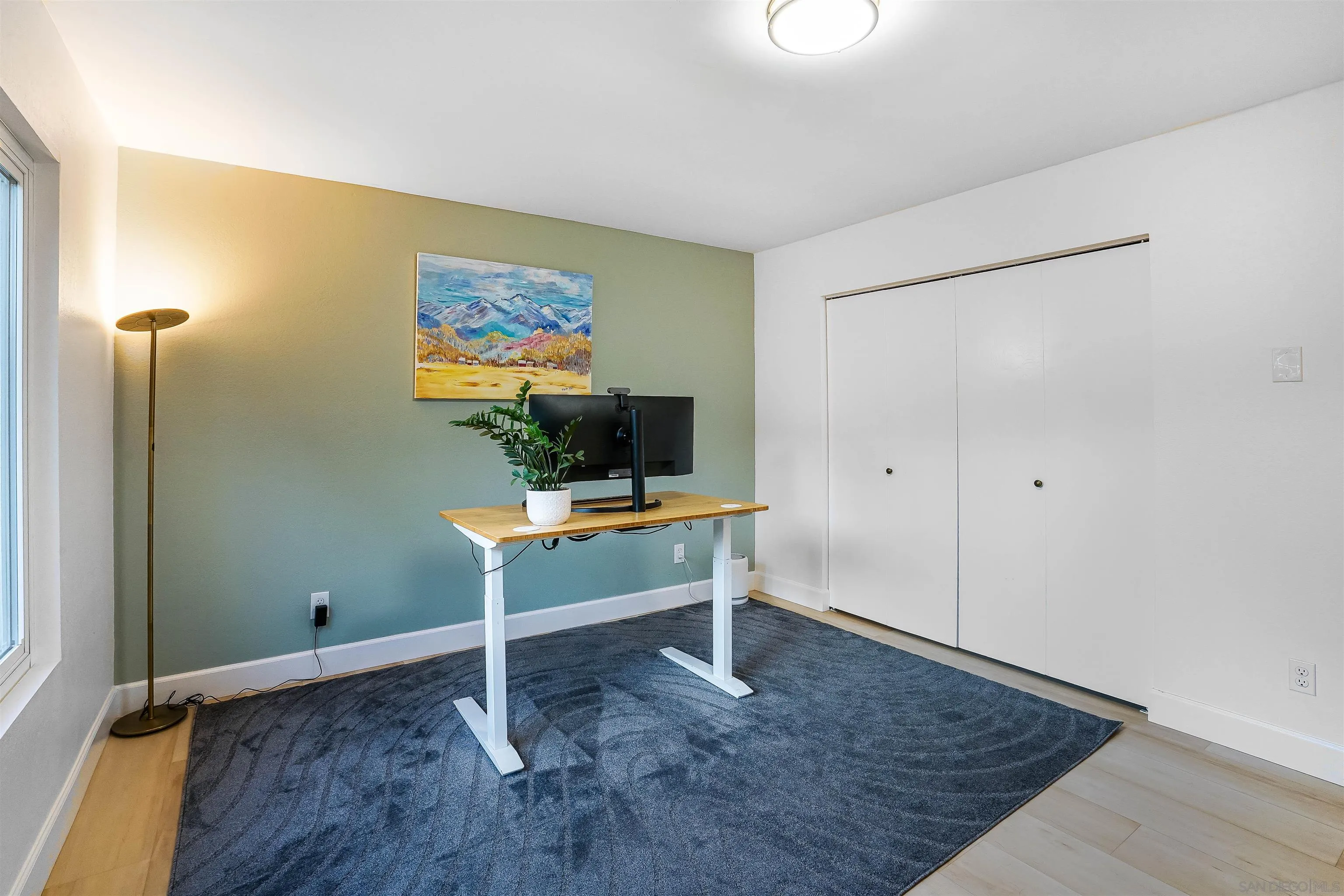 174 Vía De Casa Fallbrook, CA 92028 - Photo 30 of 47 a view of a workspace with furniture and wooden floor