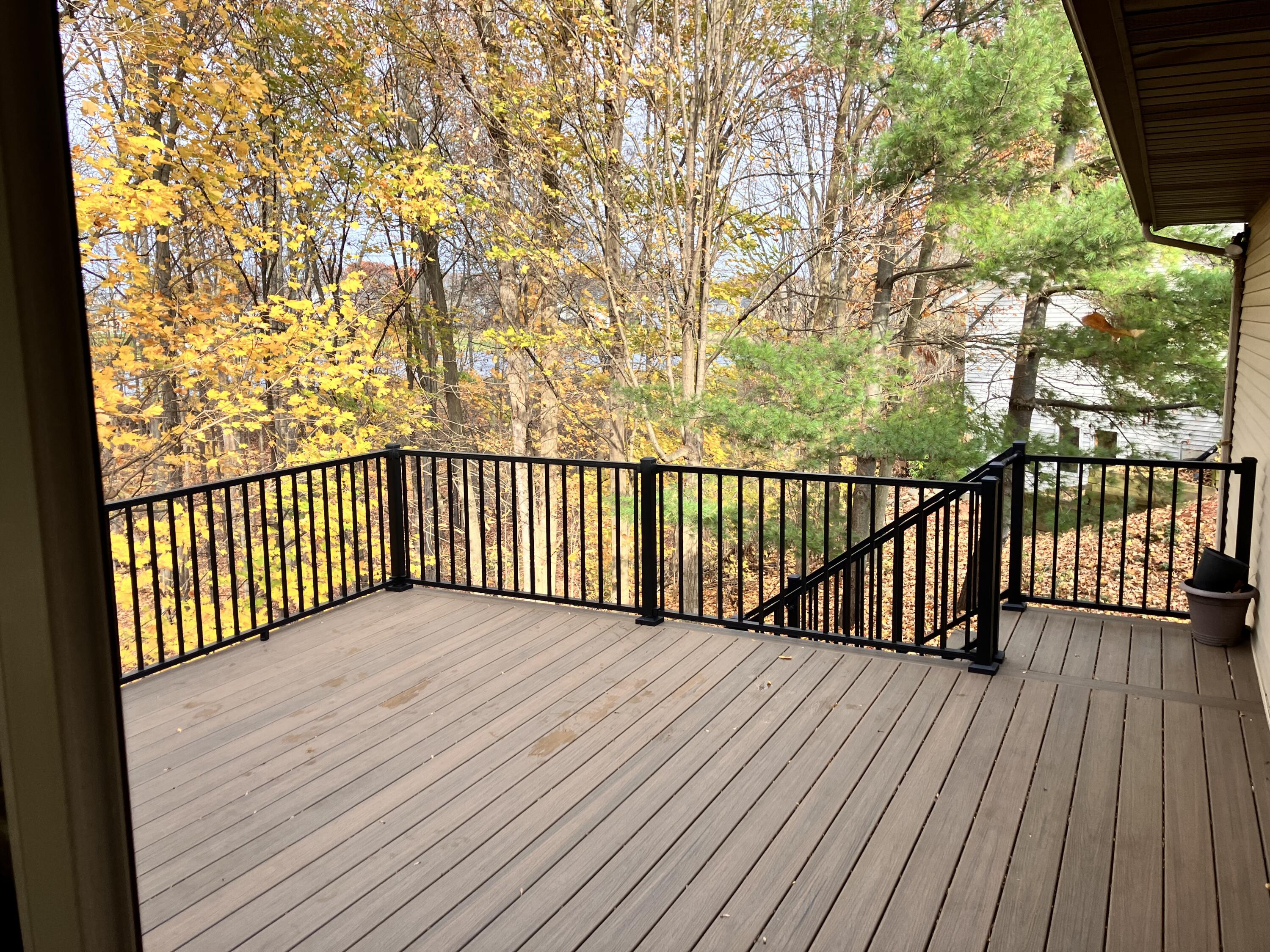 7909 Park Ridge Drive Southwest Jenison, MI 49428 - Photo 52 of 63 Looking from new room to deck and the wo