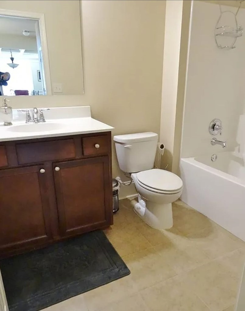 2600 Spring Chapel Drive Columbus, GA 31909 - Photo 13 of 25 a bathroom with a sink a toilet and shower