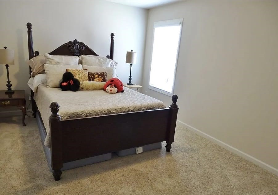 2600 Spring Chapel Drive Columbus, GA 31909 - Photo 17 of 25 a bed sitting in a bedroom next to a window