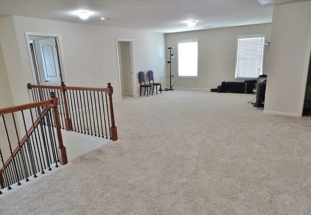 a view of a hallway with workspace