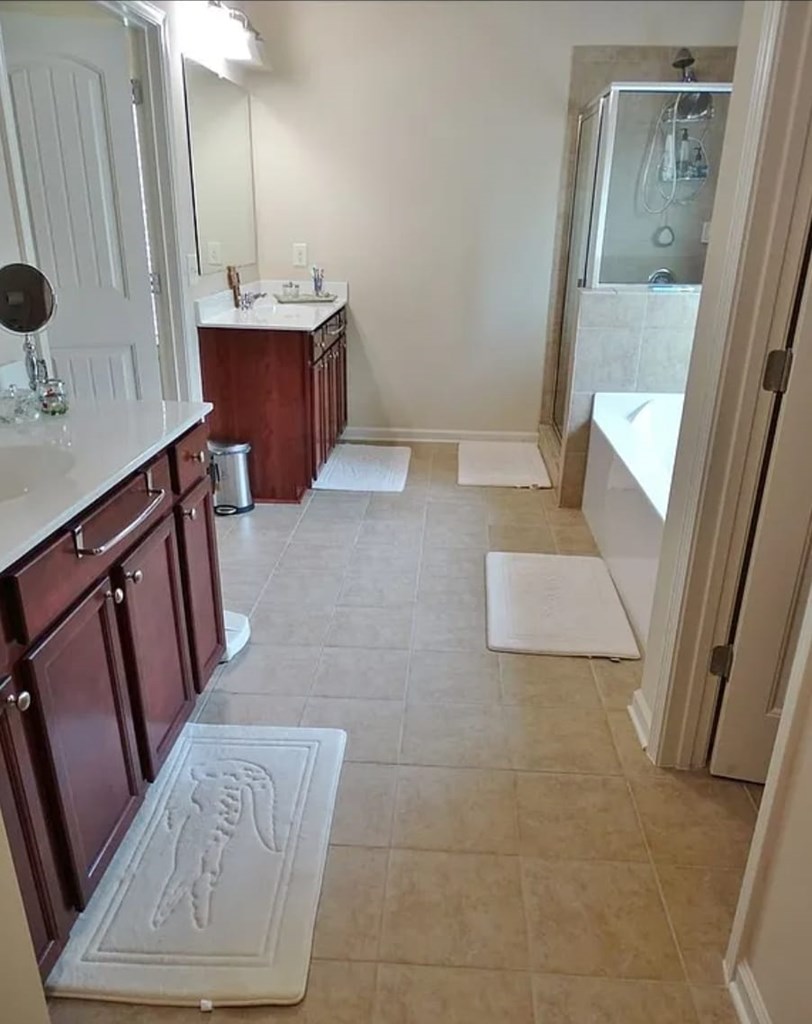 2600 Spring Chapel Drive Columbus, GA 31909 - Photo 23 of 25 a bathroom with a sink a mirror and a vanity
