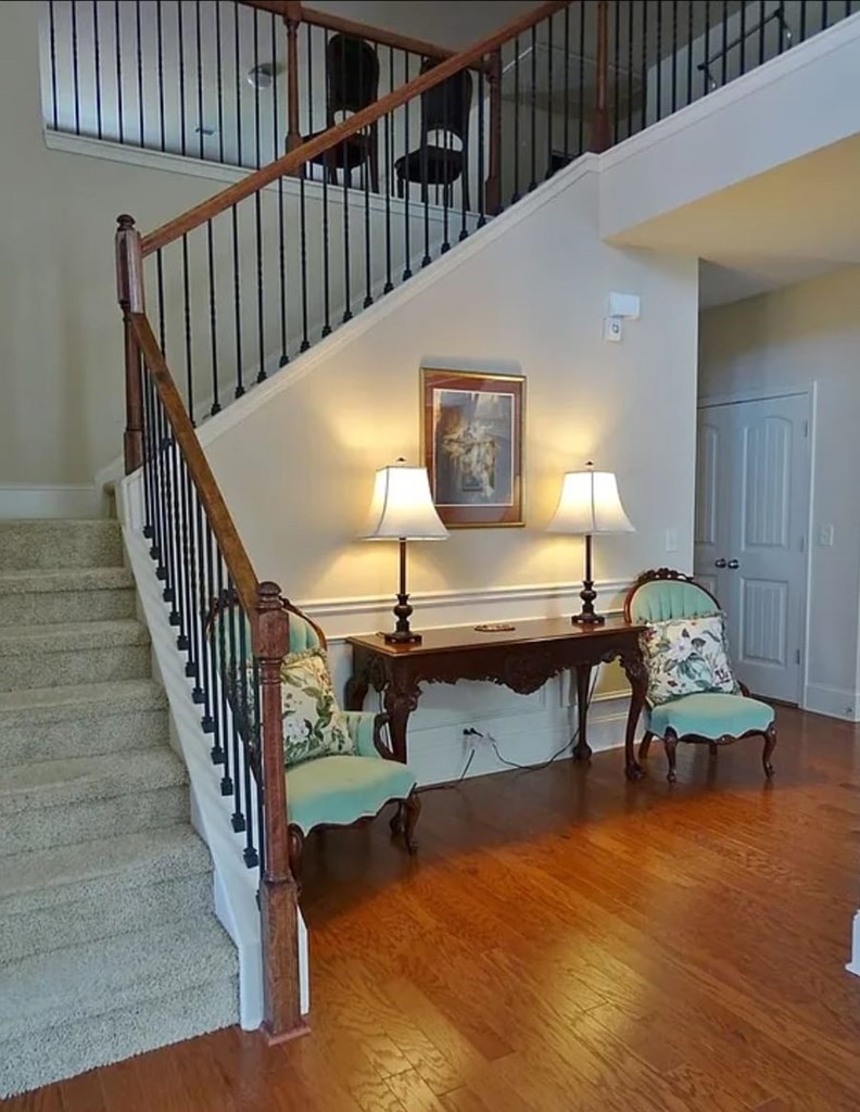 2600 Spring Chapel Drive Columbus, GA 31909 - Photo 3 of 25 a view of a livingroom with furniture stairs a fireplace