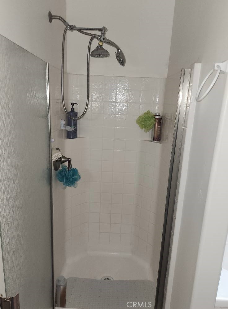 5348 Gatson Street Bakersfield, CA 93314 - Photo 17 of 33 a bathroom with a shower