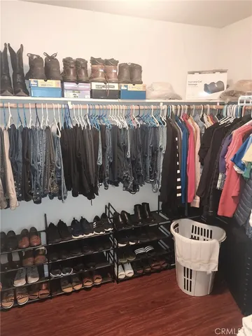 a view of a chairs and table on the wooden floor