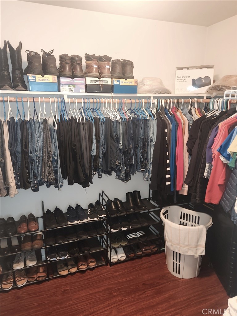 5348 Gatson Street Bakersfield, CA 93314 - Photo 18 of 33 a view of a chairs and table on the wooden floor