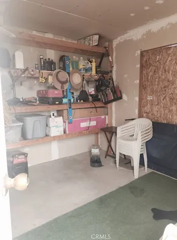 a room with wooden cabinets and table