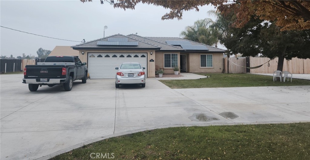 5348 Gatson Street Bakersfield, CA 93314 - Photo 3 of 33 a car parked in front of a house