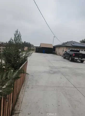 a view of a car parked on the road