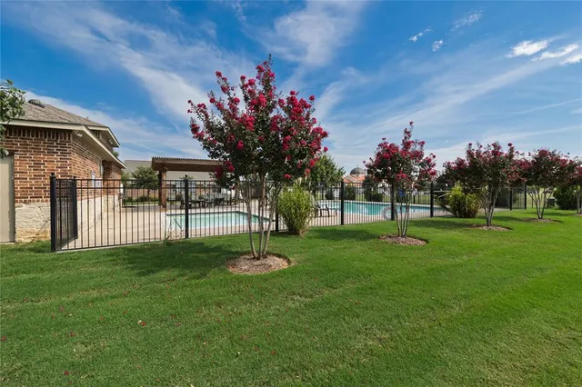a view of a backyard with a garden
