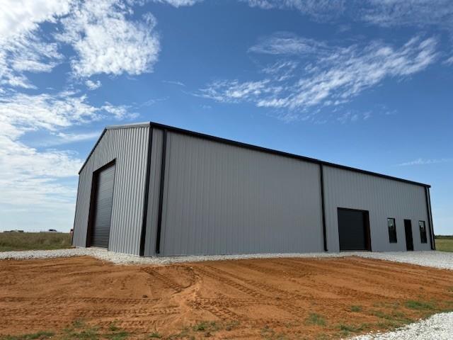 a backyard of a house with wooden floor