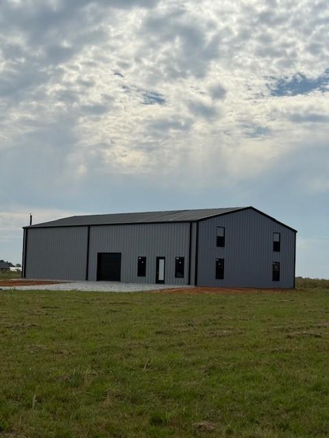 25 Private Road Sumner, TX 75486 - Photo 16 of 26 a view of a big room with an empty room