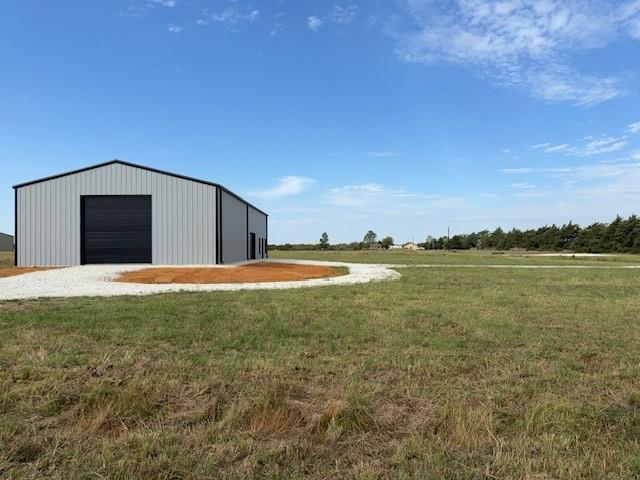 25 Private Road Sumner, TX 75486 - Photo 10 of 26 a view of a large pool with a yard