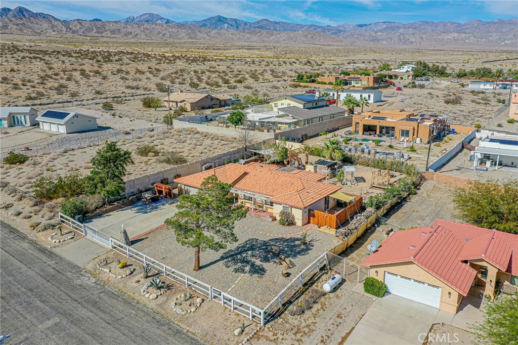 61070 Esparta Avenue Whitewater, CA 92282 - Photo 5 of 10 an aerial view of a city with lots of residential buildings and ocean view