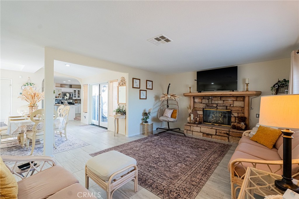 61070 Esparta Avenue Whitewater, CA 92282 - Photo 8 of 10 a living room with furniture and a flat screen tv
