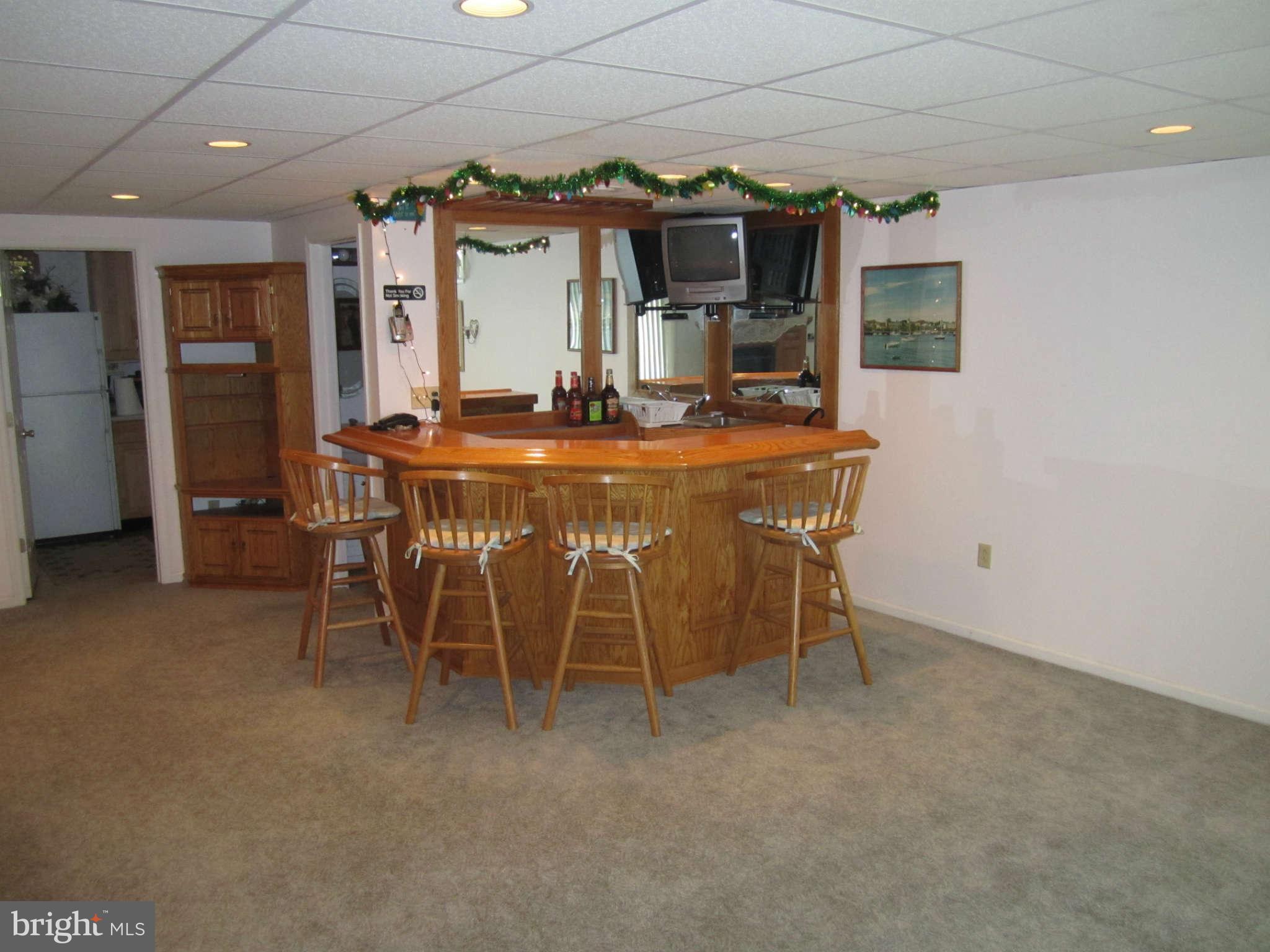 236 Hitching Post Drive Rising Sun, MD 21911 - Photo 20 of 30 Basement custom wood bar