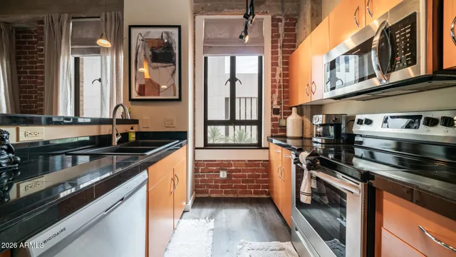 a kitchen with a stove and a microwave