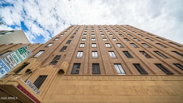 a bathroom with a glass door shower