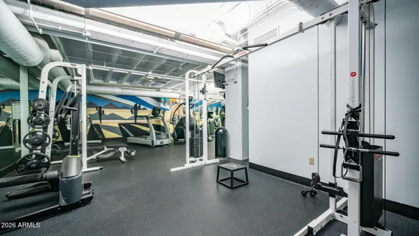 a view of a room with gym equipment