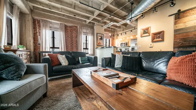 a living room with furniture and a couch