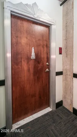 a view of a small space with wooden floor