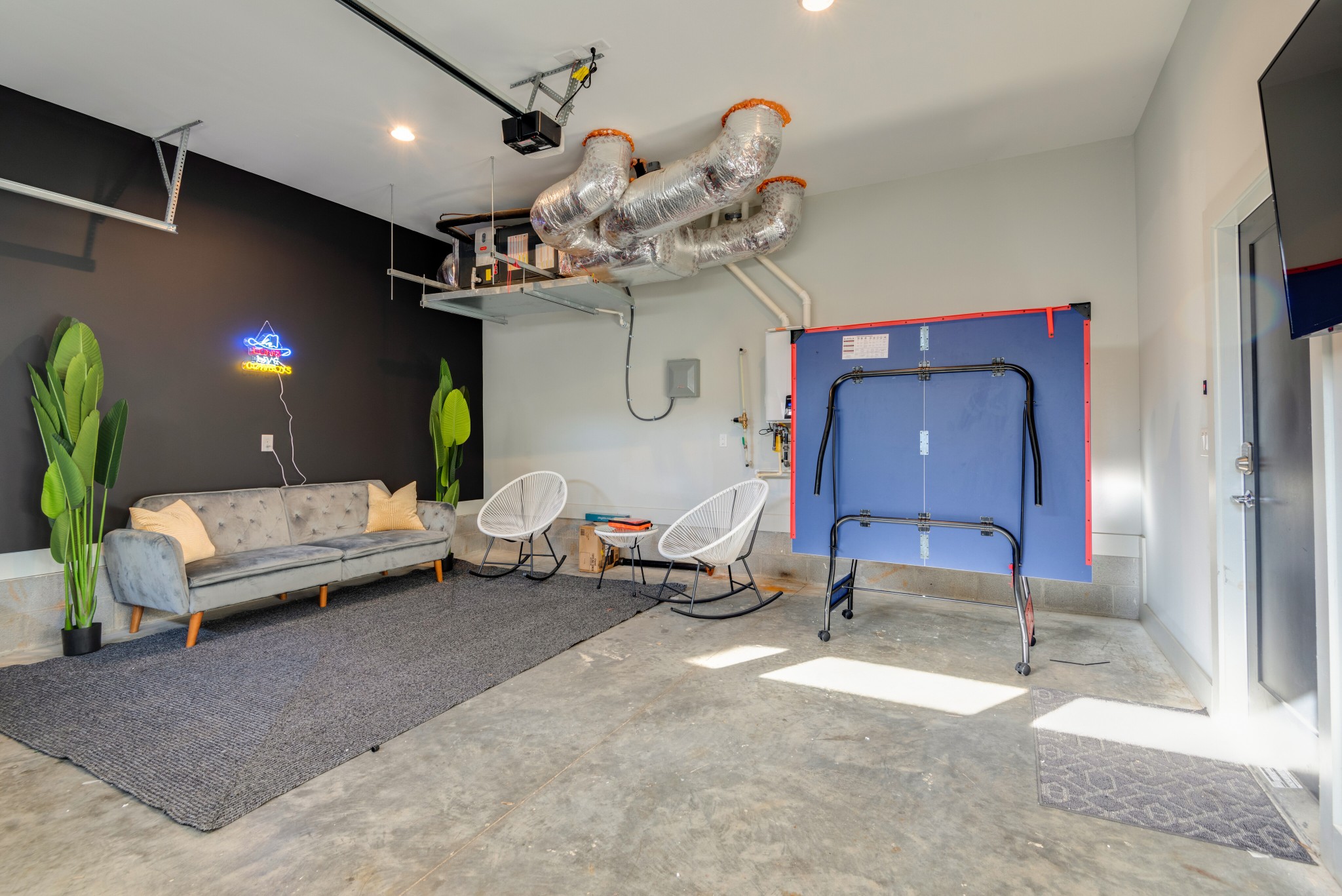 1112 Harmony Way Nashville, TN 37207 - Photo 37 of 44 a living room with furniture and a chandelier