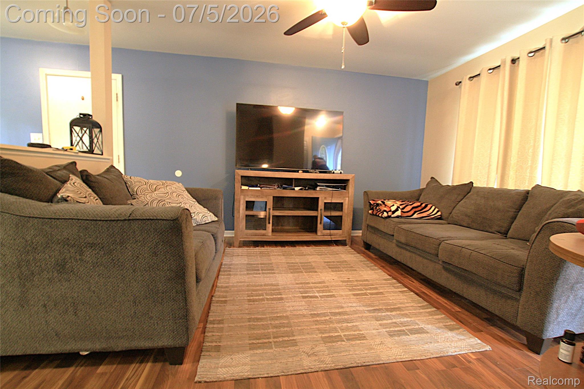 12403 Willard Road Montrose, MI 48457 - Photo 19 of 30 Living room featuring wood finished floors and a ceiling fan