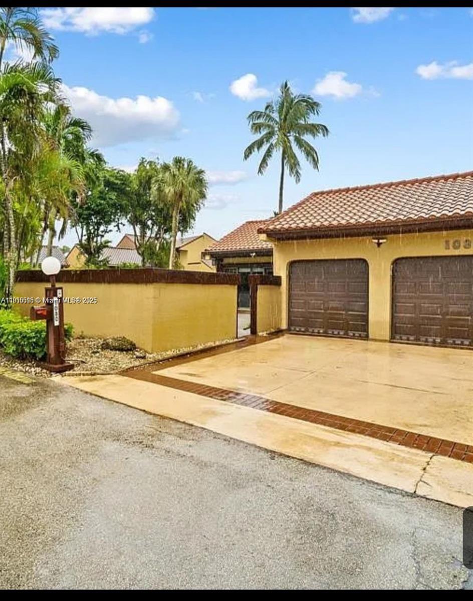 20305 Northeast 10th Court Miami, FL 33179 - Photo 3 of 10 a house with a garden space