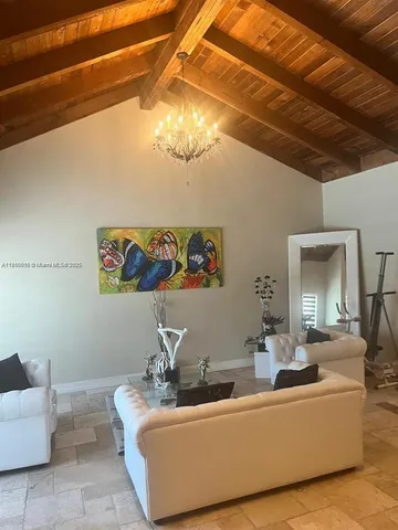 a living room with furniture and a couch