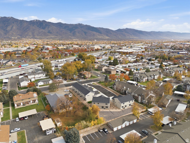 1619 North Angel Street West Layton, UT 84041 - Photo 28 of 32 Aerial view of property's location with a mountainous background and nearby suburban area