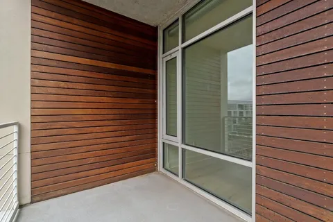 a view of a door and a window