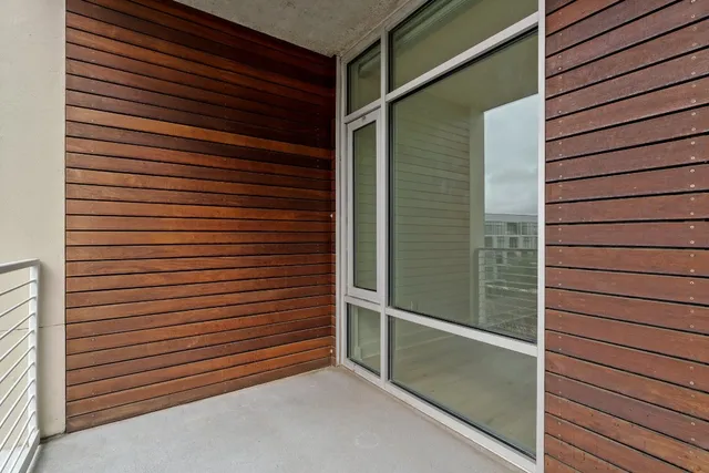 a view of a door and a window