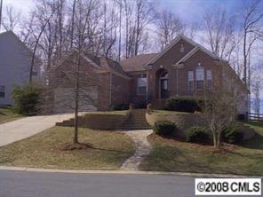 1610 Spandril Lane Fort Mill, SC 29708 - Photo 1 of 8 a front view of a house with a yard