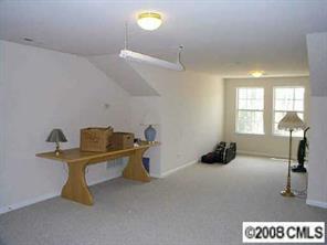 1610 Spandril Lane Fort Mill, SC 29708 - Photo 6 of 8 a view of a room with gym equipment