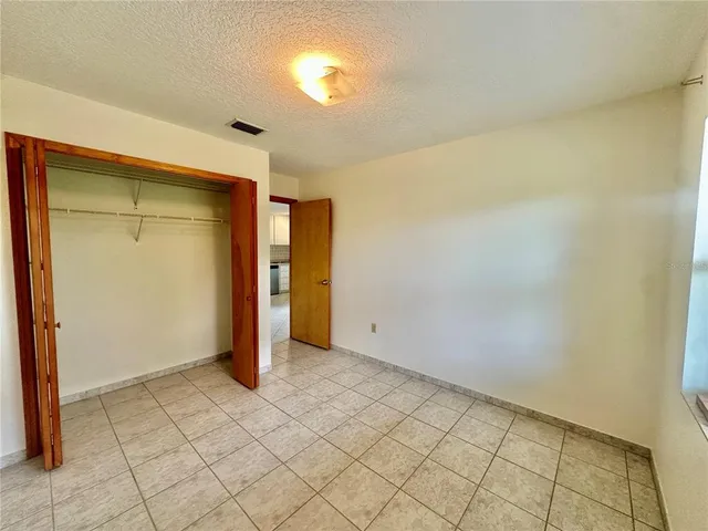 a bathroom with a sink mirror vanity and toilet