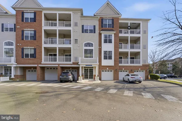 a front view of a building with a street