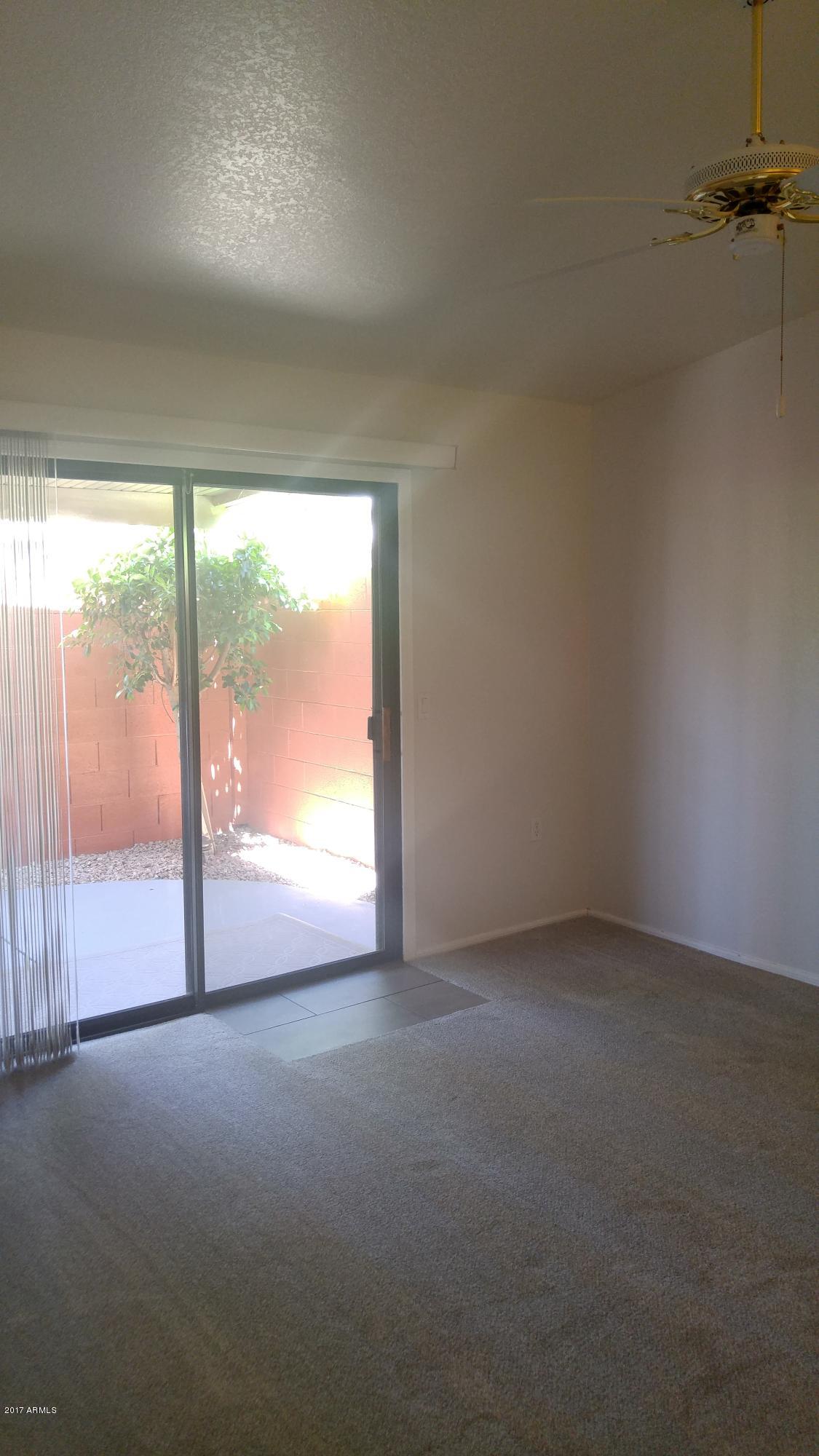2329 North Recker Road, Unit 91 Mesa, AZ 85215 - Photo 29 of 71 Master patio exit