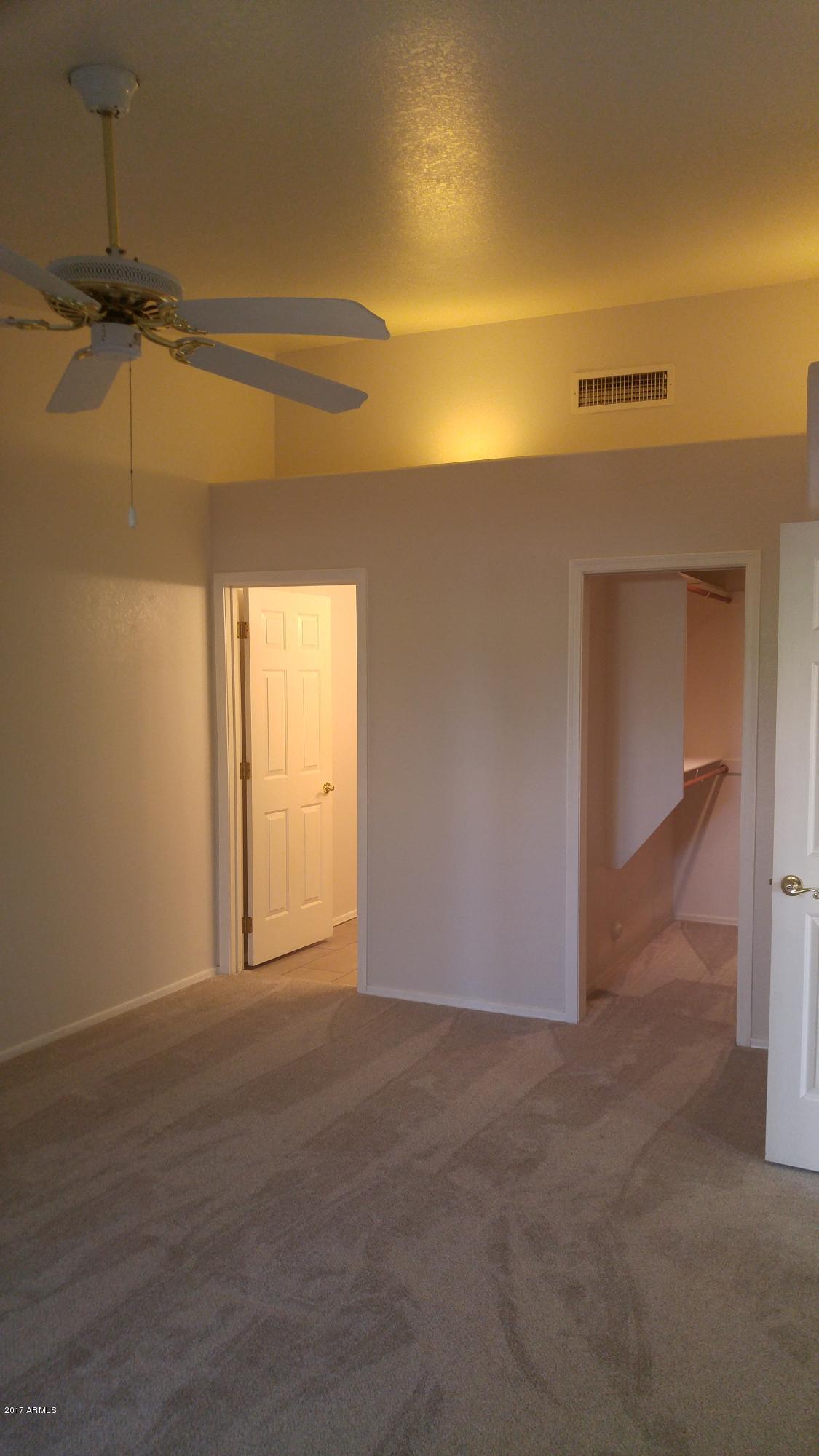 2329 North Recker Road, Unit 91 Mesa, AZ 85215 - Photo 30 of 71 Master bedroom