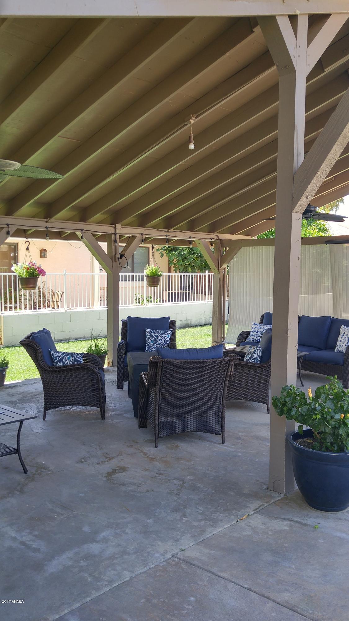 2329 North Recker Road, Unit 91 Mesa, AZ 85215 - Photo 64 of 71 Enjoy the outside pool area lounge