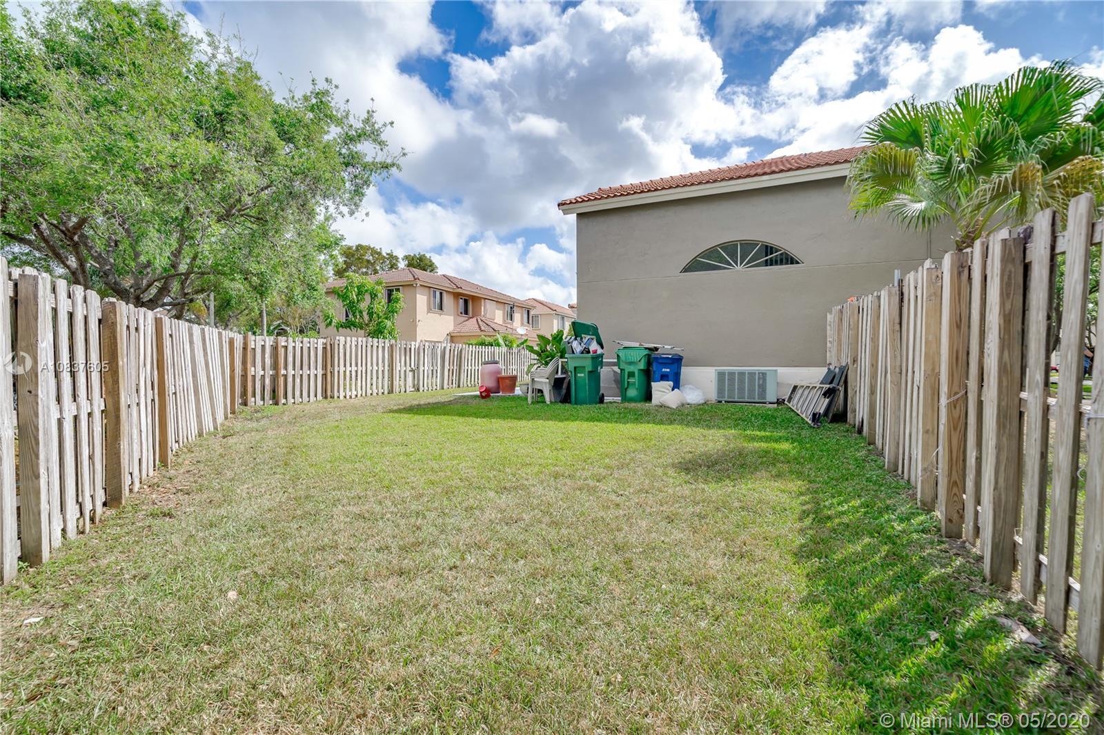 11325 Roundelay Road Cooper City, FL 33026 - Photo 33 of 46 Corner Grass area