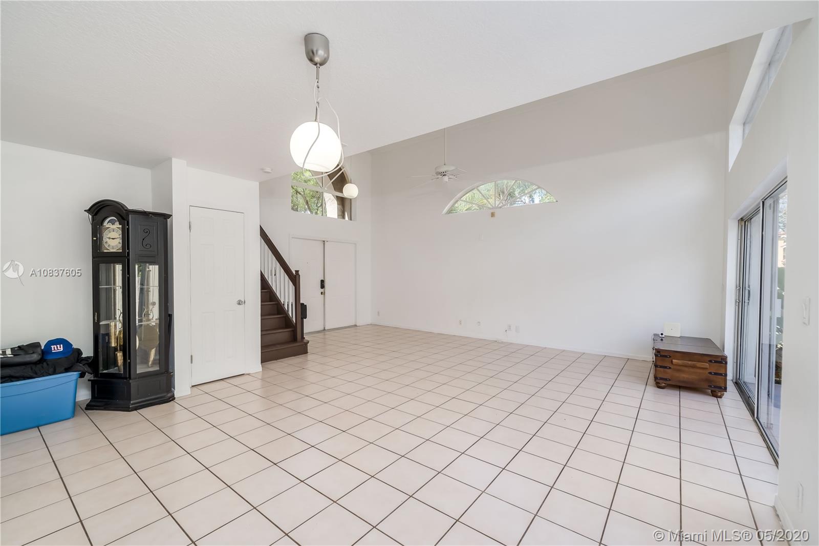 11325 Roundelay Road Cooper City, FL 33026 - Photo 6 of 46 Tile Flooring throughout downstairs.