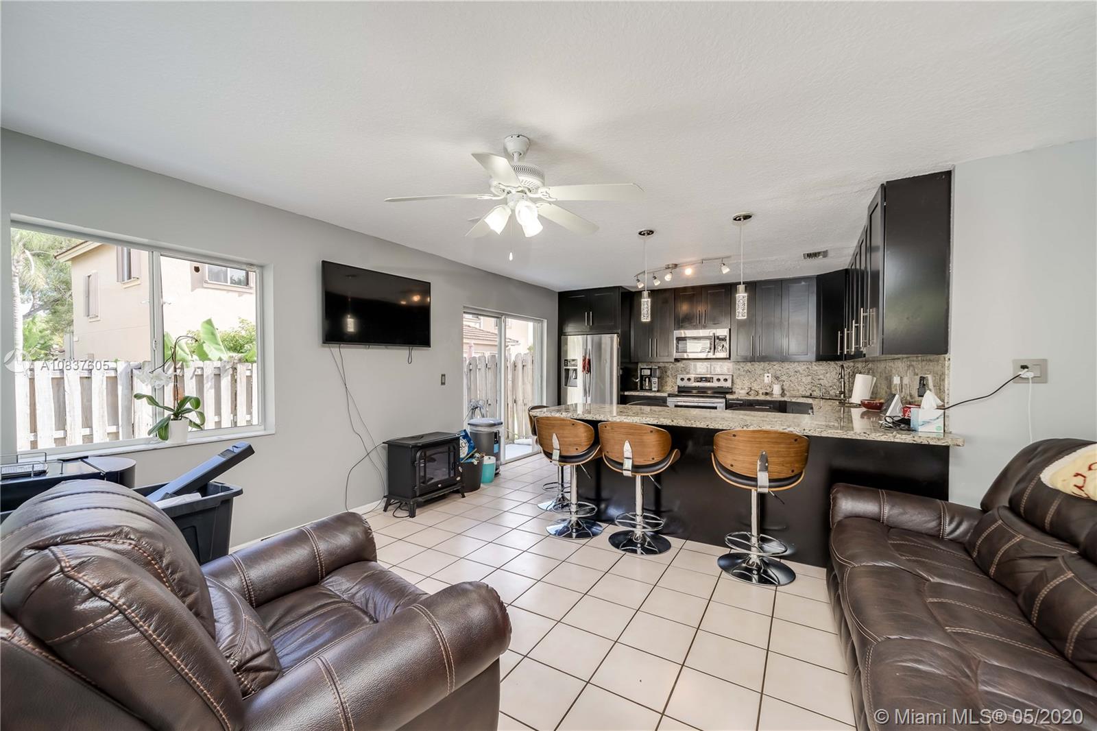 11325 Roundelay Road Cooper City, FL 33026 - Photo 8 of 46 Family Room adjacent to newly remodeled kitchen