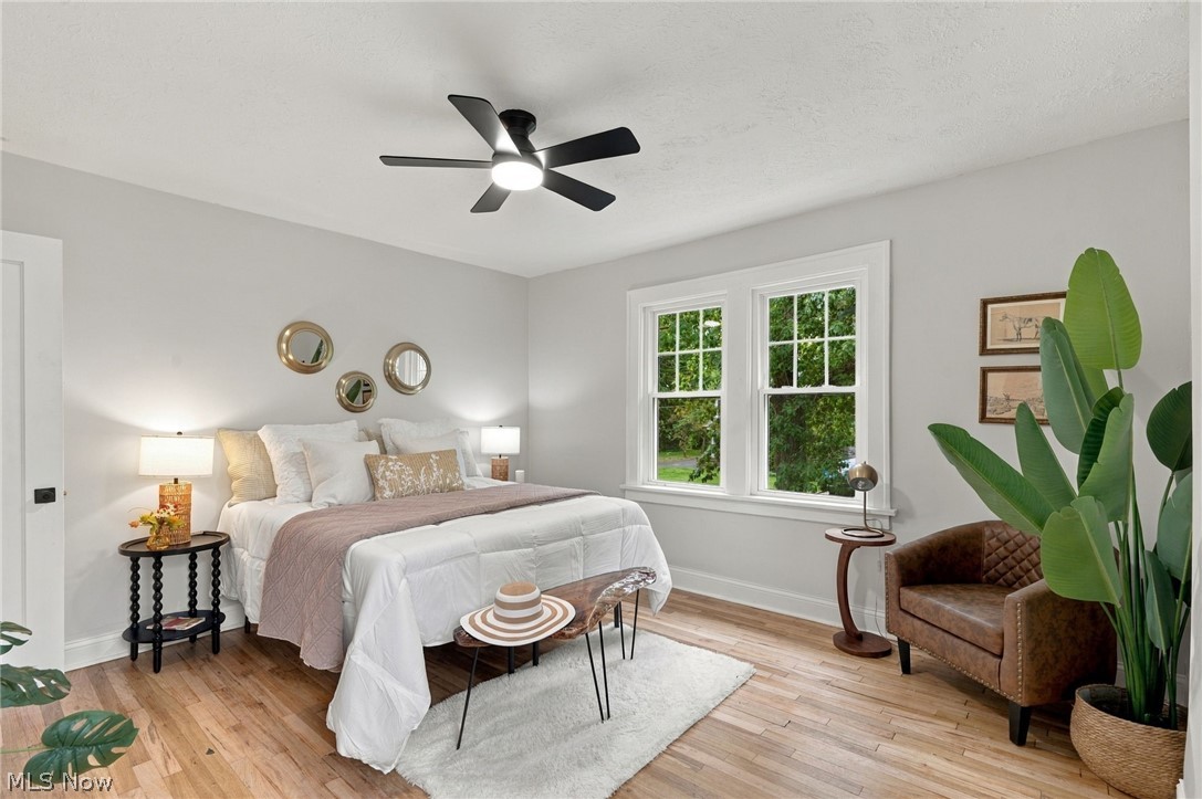 1173 Yellowstone Road Cleveland Heights, OH 44121 - Photo 24 of 44 Hardwood flooring, recessed lighting, white trim, and a ceiling fan with integrated lighting