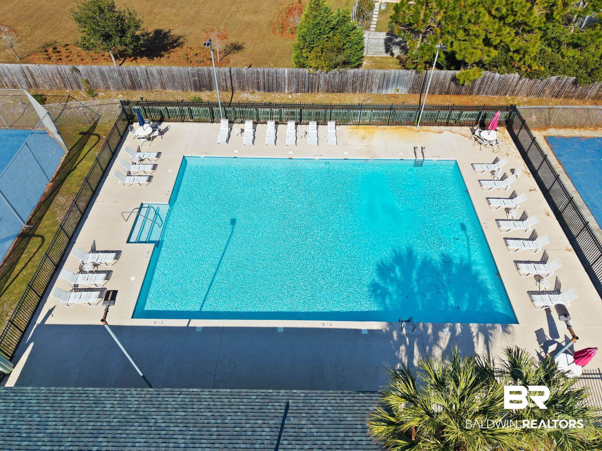 4143 Harbor Road Orange Beach, AL 36561 - Photo 31 of 33 Community pool featuring a patio
