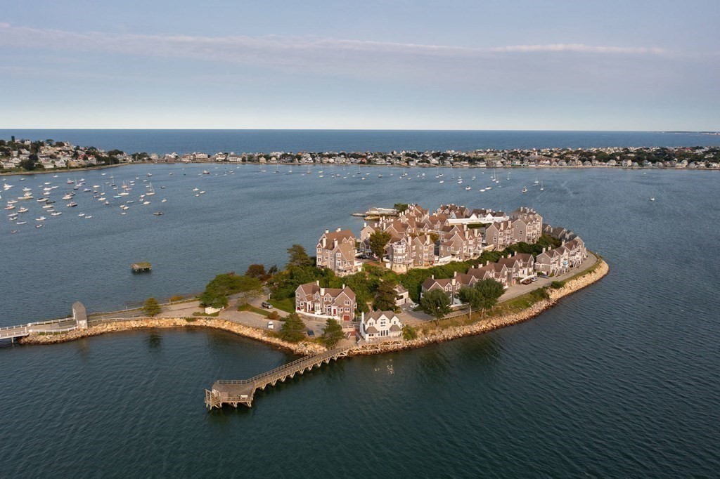 12 Spinnaker Hill Lane, Unit 12 Hull, MA 02045 - Photo 34 of 39 an aerial view of a houses with ocean view
