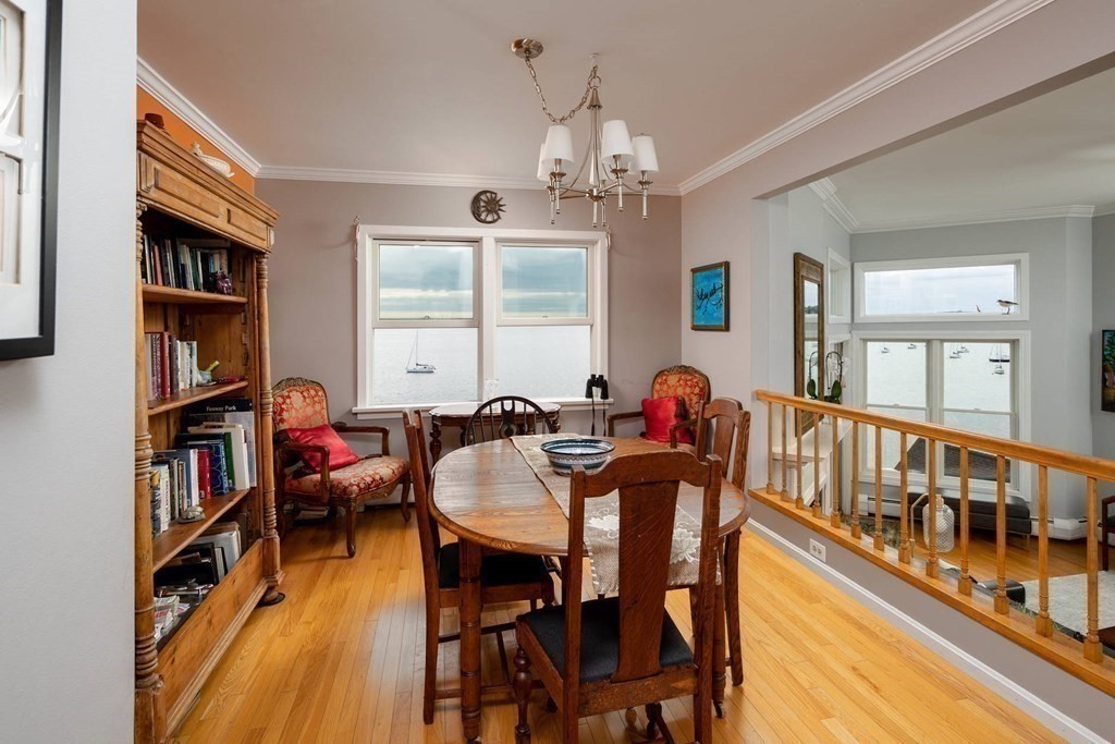 12 Spinnaker Hill Lane, Unit 12 Hull, MA 02045 - Photo 9 of 39 a view of a livingroom with furniture window and wooden floor